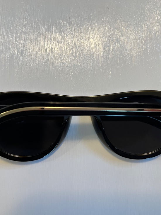 Prada sunglasses with the iconic metal plaque main image 4
